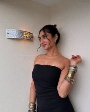 Thaanara Actress Deepti Sati in a Black Strapless Mid Length Midi Dress Pictures 06