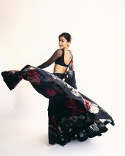 Thamma Actress Rashmika Mandanna in a Black Floral Lehenga with a Sheer Full Sleeve Blouse Pictures 02