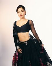 Thamma Actress Rashmika Mandanna in a Black Floral Lehenga with a Sheer Full Sleeve Blouse Pictures 03