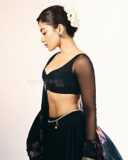 Thamma Actress Rashmika Mandanna in a Black Floral Lehenga with a Sheer Full Sleeve Blouse Pictures 04