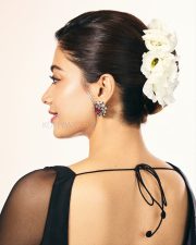 Thamma Actress Rashmika Mandanna in a Black Floral Lehenga with a Sheer Full Sleeve Blouse Pictures 05
