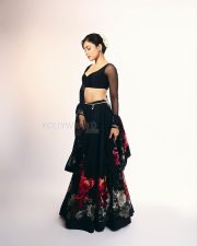 Thamma Actress Rashmika Mandanna in a Black Floral Lehenga with a Sheer Full Sleeve Blouse Pictures 06
