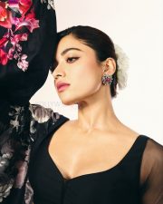 Thamma Actress Rashmika Mandanna in a Black Floral Lehenga with a Sheer Full Sleeve Blouse Pictures 07