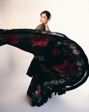 Thamma Actress Rashmika Mandanna in a Black Floral Lehenga with a Sheer Full Sleeve Blouse Pictures 09