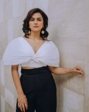 The Game Web Series Shraddha Srinath in a White Ruched Semi Off Shoulder Top with Black Pants Photos 02