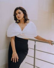 The Game Web Series Shraddha Srinath in a White Ruched Semi Off Shoulder Top with Black Pants Photos 03