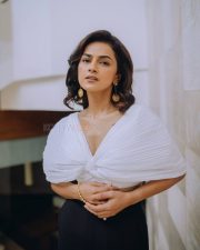 The Game Web Series Shraddha Srinath in a White Ruched Semi Off Shoulder Top with Black Pants Photos 04