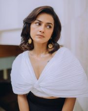 The Game Web Series Shraddha Srinath in a White Ruched Semi Off Shoulder Top with Black Pants Photos 05