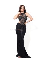 The RajaSaab Heroine Nidhhi Agerwal in a Bold Black Lace Sheer Corset Halter Top with a Low Rise Maxi Skirt Photos 08