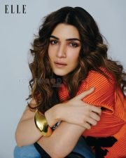 Trendsetting Actress Kriti Sanon in a Navy Strapless Bodysuit and Denim Frayed Maxi Skirt Photos 03