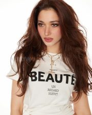 Trendsetting Actress Tamannaah Bhatia in a White Graphic Knotted Crop Tee Photos 03