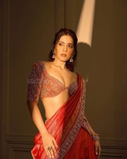 Trendy Beauty Raashii Khanna in a Orange Bridal Lehenga Photos 01