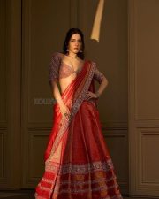 Trendy Beauty Raashii Khanna in a Orange Bridal Lehenga Photos 03
