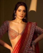 Trendy Beauty Raashii Khanna in a Orange Bridal Lehenga Photos 06