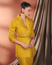 Vibrant Actress Rakul Preet Singh in a Mustard yellow textured blazer suit Photos 01