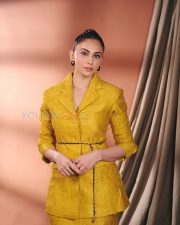 Vibrant Actress Rakul Preet Singh in a Mustard yellow textured blazer suit Photos 05