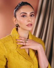 Vibrant Actress Rakul Preet Singh in a Mustard yellow textured blazer suit Photos 07