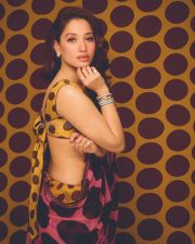 Vibrant Actress Tamannaah Bhatia in a yellow and pink geometric patterned crop top Photos 01