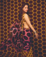 Vibrant Actress Tamannaah Bhatia in a yellow and pink geometric patterned crop top Photos 03