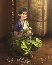 Vintage Beauty Pooja Hegde in a Green and Purple Kanchipuram Silk Saree Photos 02