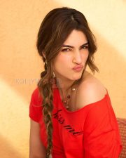 Vivacious Actress Kriti Sanon in a Red Off Shoulder Top Photos 01