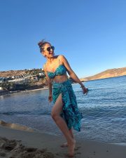 Vivacious Actress Rakul Preet Singh in a Teal Animal Print Bikini With Sarong Photos 01