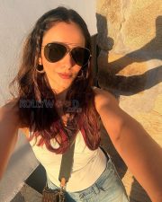 Vivacious Actress Rakul Preet Singh in a Teal Animal Print Bikini With Sarong Photos 02