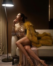 Voluptuous Malaika Arora in a Thigh High Slit Gold Crystal Gown Pictures 02