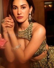 Actress Amyra Dastur in an Embellished Lehenga with a Halter Neck Crop Top Photos 02