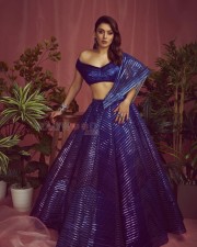 Actress Hansika Motwani in a Blue Embroidered Layered Lehenga Photos 01