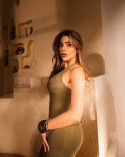 Alluring Nikki Tamboli Cleavage in a Olive Green Ribbed Deep V Halter Bodycon Dress Photos 08 Alluring Nikki Tamboli Cleavage in a Olive Green Ribbed Deep V Halter Bodycon Dress Photos 08
