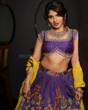 Appealing Iswarya Menon in a Vibrant Traditional Purple Lehenga Photos 01