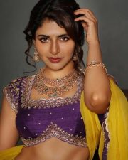 Appealing Iswarya Menon in a Vibrant Traditional Purple Lehenga Photos 03