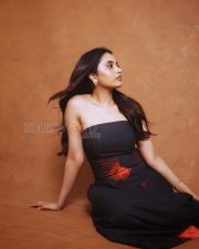 Artistic Actress Priyanka Arul Mohan in a Black Strapless Tube Dress with Red Floral Print Photos 01 Artistic Actress Priyanka Arul Mohan in a Black Strapless Tube Dress with Red Floral Print Photos 01