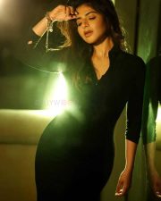 Bazooka Actress Iswarya Menon in a Black Floor Length Dress Pictures 03