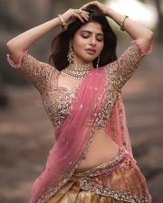 Bazooka Movie Actress Iswarya Menon in a Light Pink Dress Photos 04
