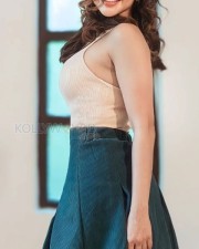 Beauty Doll Iswarya Menon in a Sleeveless Crop Top and Mini Skirt Photos 03