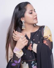 Best Telugu Supporting Actress Anasuya Bharadwaj in a Floral Printed Anarkali Suit Photos 01