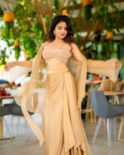 Bhaje Vayu Velya Actress Iswarya Menon in a Golden Crop Top with Matching Skirt Photos 01