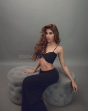 Bold Nikki Tamboli in a Black Dress Pictures 01
