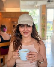 Breezy Actress Iswarya Menon in a Cream cami top Photos 01 Breezy Actress Iswarya Menon in a Cream cami top Photos 01