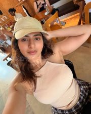 Breezy Actress Iswarya Menon in a Cream cami top Photos 03 Breezy Actress Iswarya Menon in a Cream cami top Photos 03