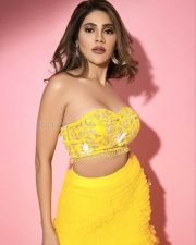 Busty Nikki Tamboli in Yellow Dress Picture 01