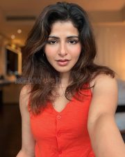 Charming Actress Iswarya Menon in a Red Sleeveless Button Down Top Photos 01