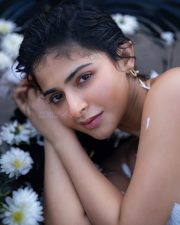 Chic Iswarya Menon in a White Cotton Sleeveless Top with Thin Spaghetti Straps Photos 04