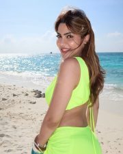 Dazzling Actress Nikki Tamboli in a Neon Green Beach Co ord Photos 08