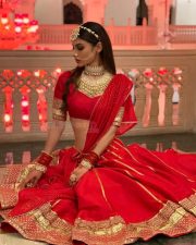 Dazzling Mouni Roy in a Red Wedding Lehenga Photos 04