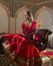 Dazzling Mouni Roy in a Red Wedding Lehenga Photos 05