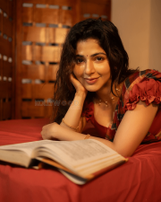 Delightful Actress Iswarya Menon in a Red Checked Saree Puff sleeve Blouse Photos 01