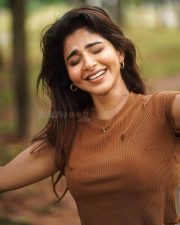 Desirable Iswarya Menon in a Brown Crop Top and White Denim Pants Photos 01